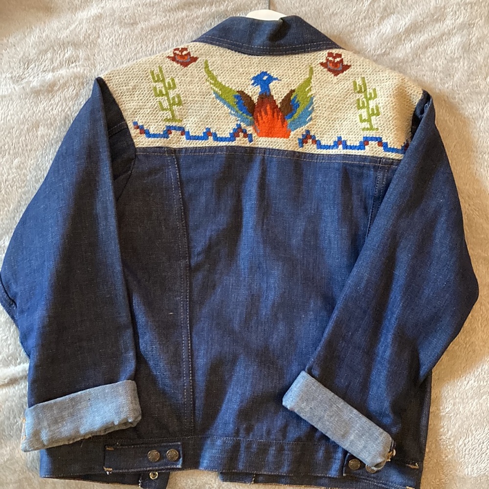 Vintage unisex denim snap closure jacket with desert-themed embroidery on back